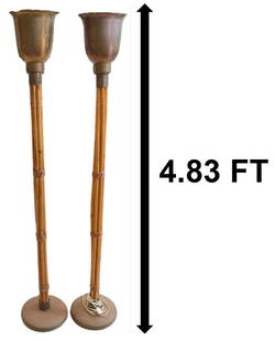 (2) Rattan and Brass Floor Lamps: Rattan and Brass Floor Lamps.&nbsp; Torchiere style lamps. Each topped with a flared, chalice-shaped shade made of brass. Stem of lamps made of rattan. Round base.&nbsp; Size:&nbsp;10 x 10 x 58 in.&nb