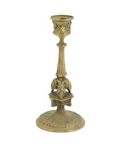 Antique Bronze Candle Holder with Satyr Ornamentation: Antique Bronze Candle Holder with Satyr Ornamentation. Leaf and vine decorations around the cup at the top, with a lined column and three satyr heads with interlocking horns in the middle, and a wide