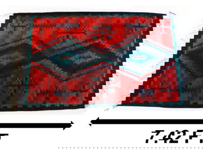 Very Long Mexican Zapotec Wool Rug with Eye Dazzler and Spanish Cross Patterns: Very Long Mexican Zapotec Wool Rug with Eye Dazzler and Spanish Cross Patterns. Striking black, blue, turquoise, and red tones depict two large eyes with a red center, while around them swirl various