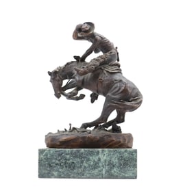 After Frederic Remington (1861-1909) American, Bronze Statue