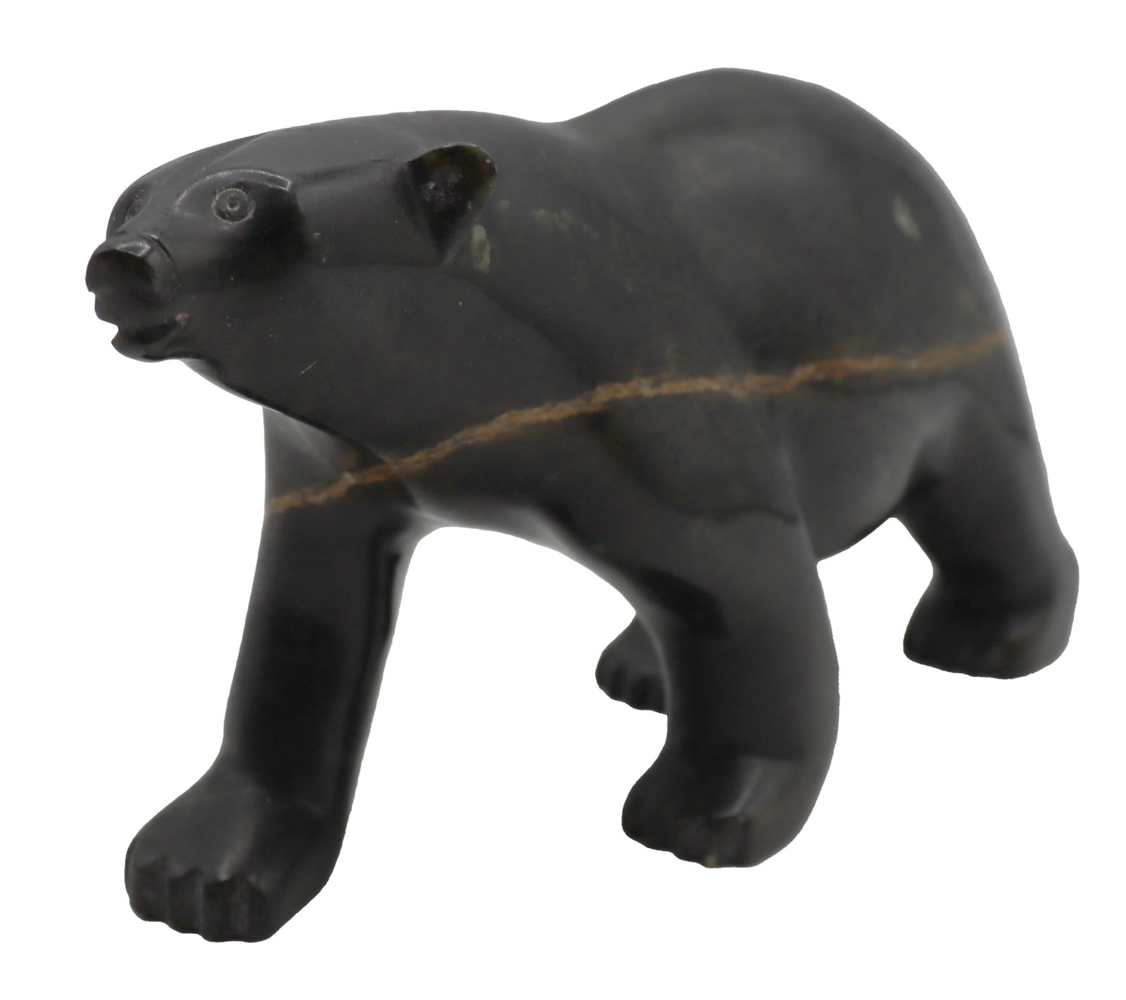 Inuit Eskimo Serpentine Stone Carved Polar Bear: Inuit Eskimo Serpentine Stone Carved Polar Bear. Size: 7 x 2 1/2 x 4 in. 