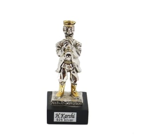 H. Karshi (20th Century) Sterling Silver Judaica Statuette of Flute Player
