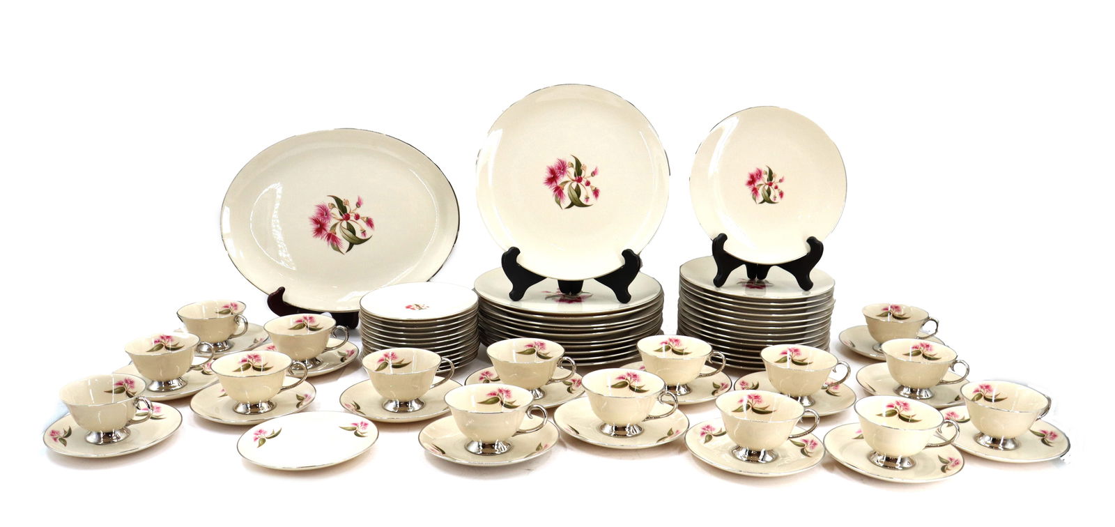 (70) Flintridge China Pink Thistle Serveware Set: (70) Flintridge China Pink Thistle Serveware Set. Lot of seventy serveware items, including 12 salad plates, 14 lunch plates, 11 dinner plates, serving tray, 16 tea cups, 17 saucers. Condition:&
