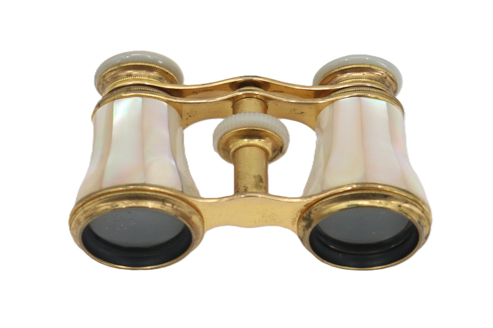 French Mother of Pearl and Brass Paris Opera Glasses: French Mother of Pearl and Brass Paris Opera Glasses. Marked "Iris Paris" on the irises. Small makers mark and the word "Trio" on inside of connector piece. Condition: Commen