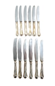 (12) German .800 Butter Knives - 23.495 ozt.
