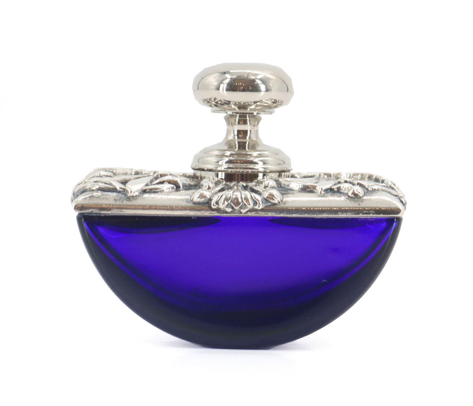 Antique Cobalt Blue Glass Rocker Blotter With Dragonfly Silver Overlay: Antique Cobalt Blue Glass Rocker Blotter With Dragonfly and Floral Silver Overlay. Cobalt blue glass in a half-moon shape. Rounded handle. Size: 2 x 3 1/4 x 3 in. A rocker blotter is a specific