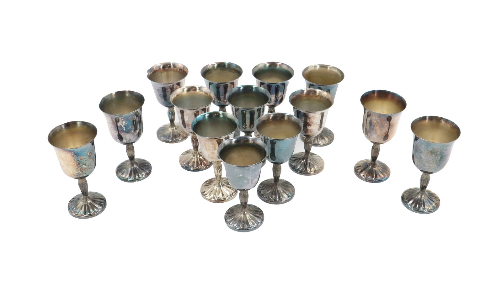 (10) International Silver Company Silver Plate Wine Goblets and (4) Water Goblets: (10) International Silver Company Silver Plate Wine Goblets and (4) Water Goblets. They all share the same Wild Rose pattern on the stem and base, and all are marked on the underside with the company