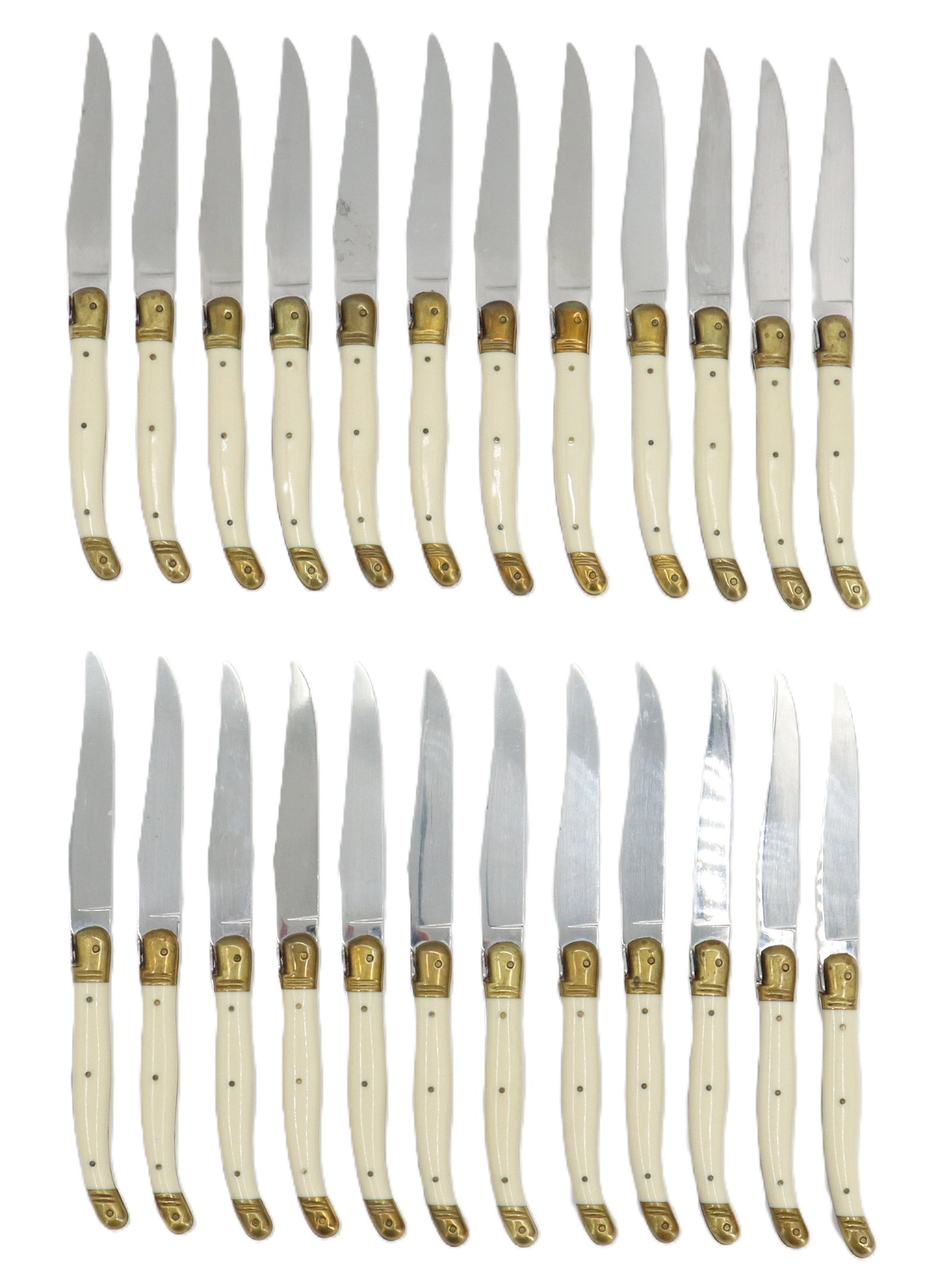 (24) Laguiole Steak Knives with Boxes: (24) Laguiole Steak Knives with Boxes. Set of twenty-four French Laguiole steak knives with bone handles, brass fittings, stainless steel blades. Including two eight-piece fitted boxes. Box Size: 