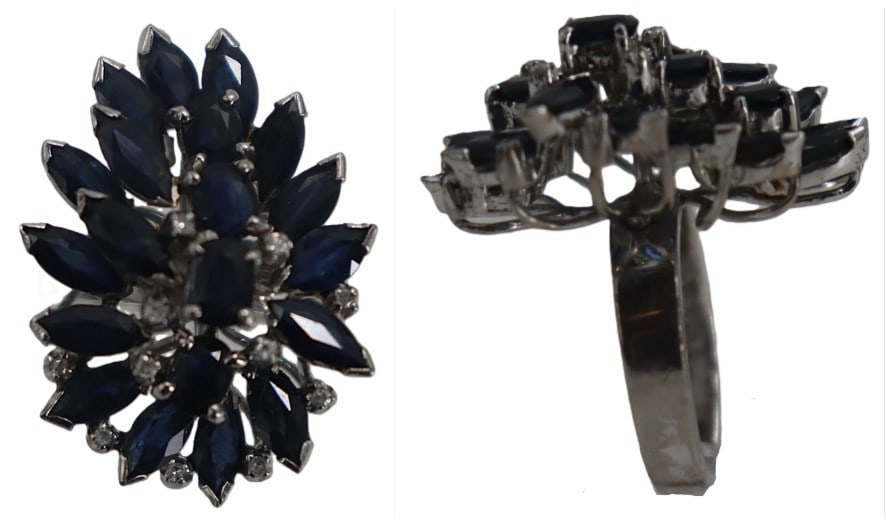 One Marked 18k Gold, Sapphire, and Diamond Cocktail Ring - Gross 10.4 g.: One Marked 18k Gold, Sapphire, and Diamond Cocktail Ring. Marked on inside. 18k white gold. The stones are predominantly marquise-cut and arranged in an organic, starburst pattern, with small rou