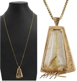 One Rutilated Quartz and 14k Gold Pendant on 14k Gold Chain- Gross 14.8 g.