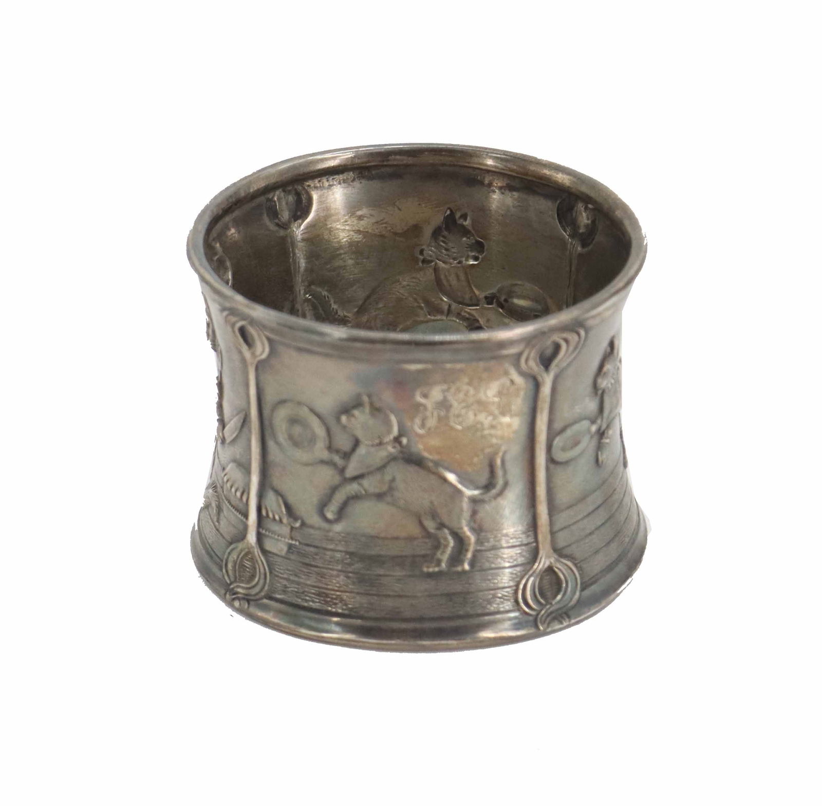 Tiffany & Co. Sterling Silver Napkin Ring - 1.9 ozt.: Tiffany & Co. Sterling Silver Napkin Ring - 1.9 ozt. Decorated with whimsical images of cats preparing for dinner. Marked on the inside. Size: 2 1/4 x 1 3/4 in. Weight: 1.9 ozt. 