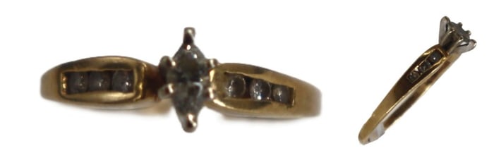 One Marked 14k Gold and Diamond Ring - Gross 1.6 g.