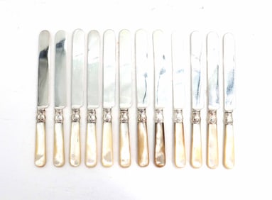 (12) Meriden Cutlery Co. Butter Knives with Sterling Wraps and Mother of Pearl Handles