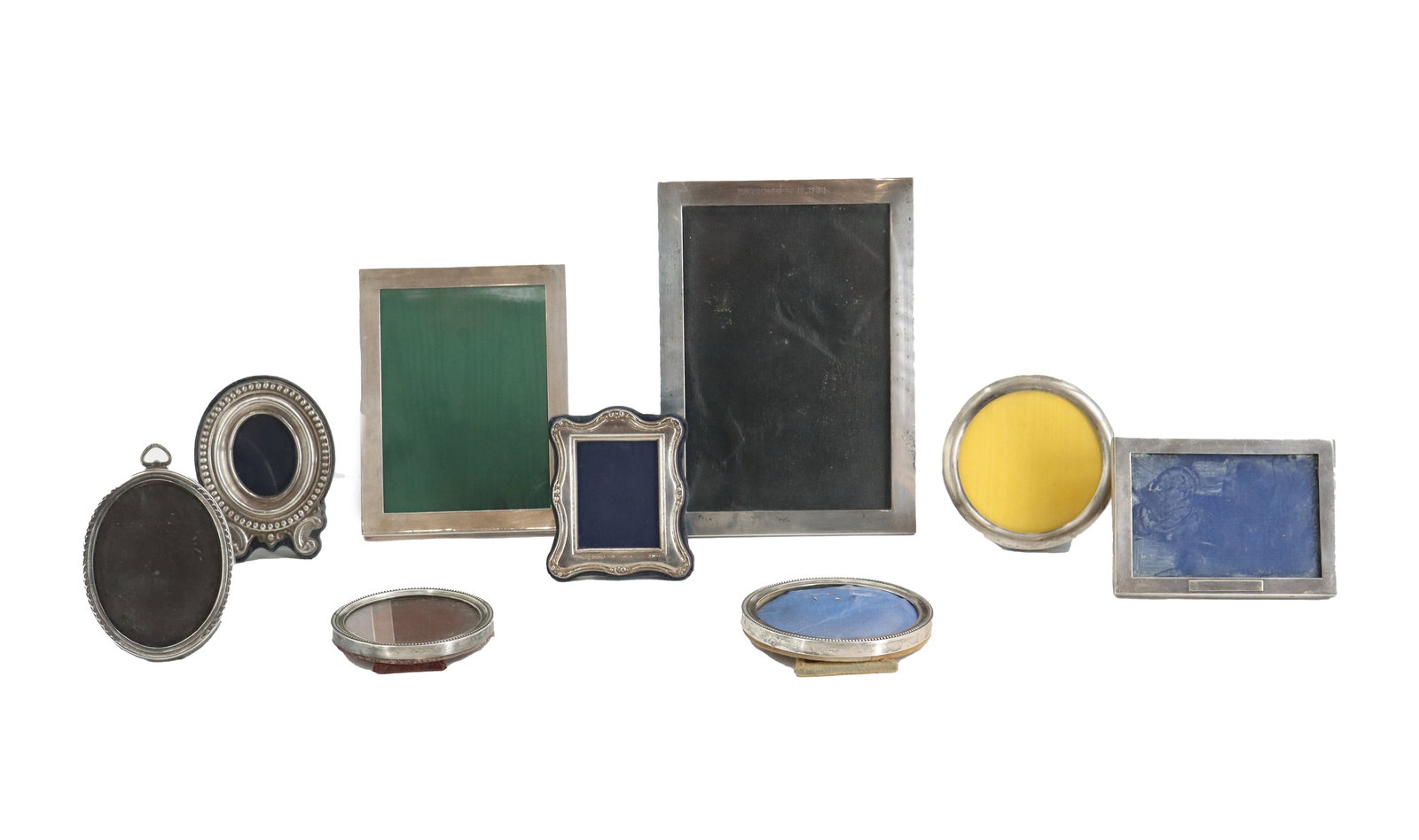 (9) Vintage American and English Sterling Silver Picture Frames: (9) Vintage American and English Sterling Silver Picture Frames. Various sizes and shapes, all bearing hallmarks and the largest rectangular piece reading "December 11th, 1965" at the top. A