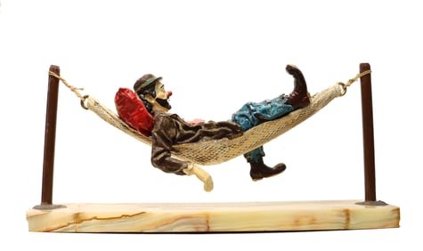 Ron Lee (1947-2017) American, Hand Painted Pewter and Onyx Clown Sculpture, "Clown Resting in a