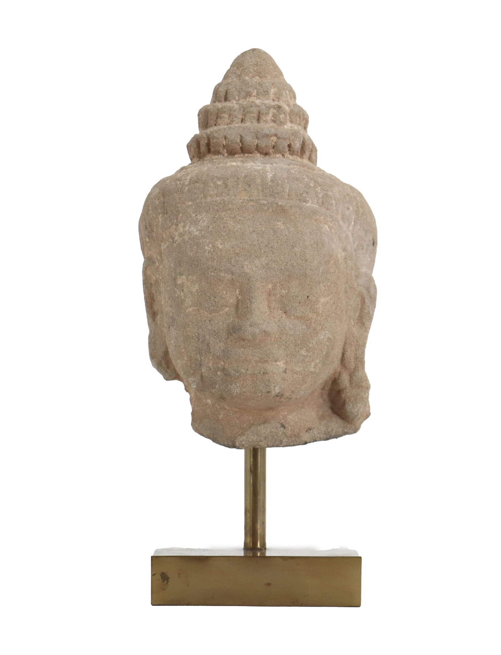 Antique Cambodian Khmer Region Carved Sandstone Buddha Head: Antique Cambodian Khmer Region Carved Sandstone Buddha Head. Carved sandstone Buddha head on display stand, antique, possibly 15th century. Size: 4 1/2 x 5 x 12/ 1/4 in. Buddha heads