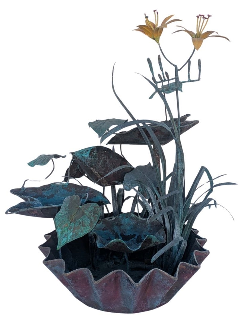 Outdoor Fountain Copper With Green Patina Approximately 3 foot: Outdoor Fountain Copper With Green Patina Approximately 3 foot. Cascading lily pad design culminating in a crown / bottle cap collecting pool. Comes with the small pump that was originally used, but w