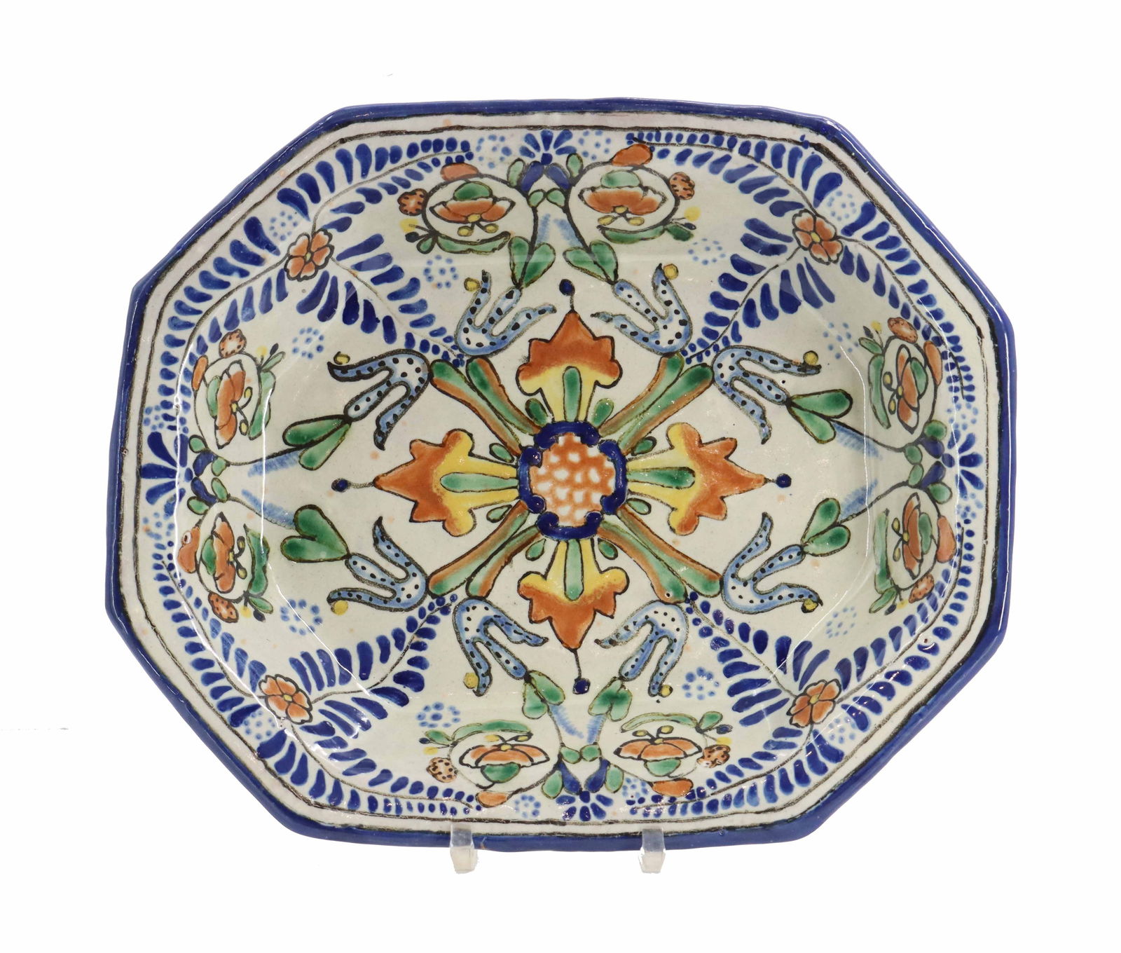 Hand Painted Mexican Talavera Ceramic Serving Bowl: Hand Painted Mexican Talavera Ceramic Serving Bowl. Marked on underside. Octagonal shape and a vibrant, detailed hand-painted design. Size: 14 x 11 1/2 x 3 in.