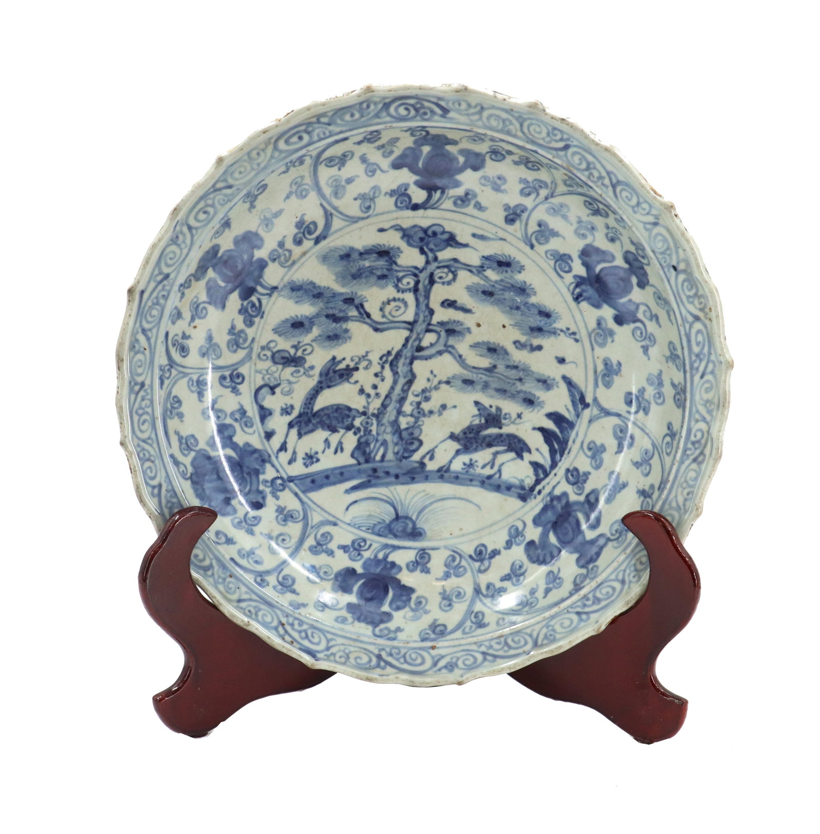 Chinese Blue and White Porcelain Plate: Chinese Blue and White Porcelain Plate. Blue and white porcelain plate with deer and tree, with foliate on rim. Size: 2 1/2 x 15 x 15 in. Blue and white porcelain is perhaps the most famous category o