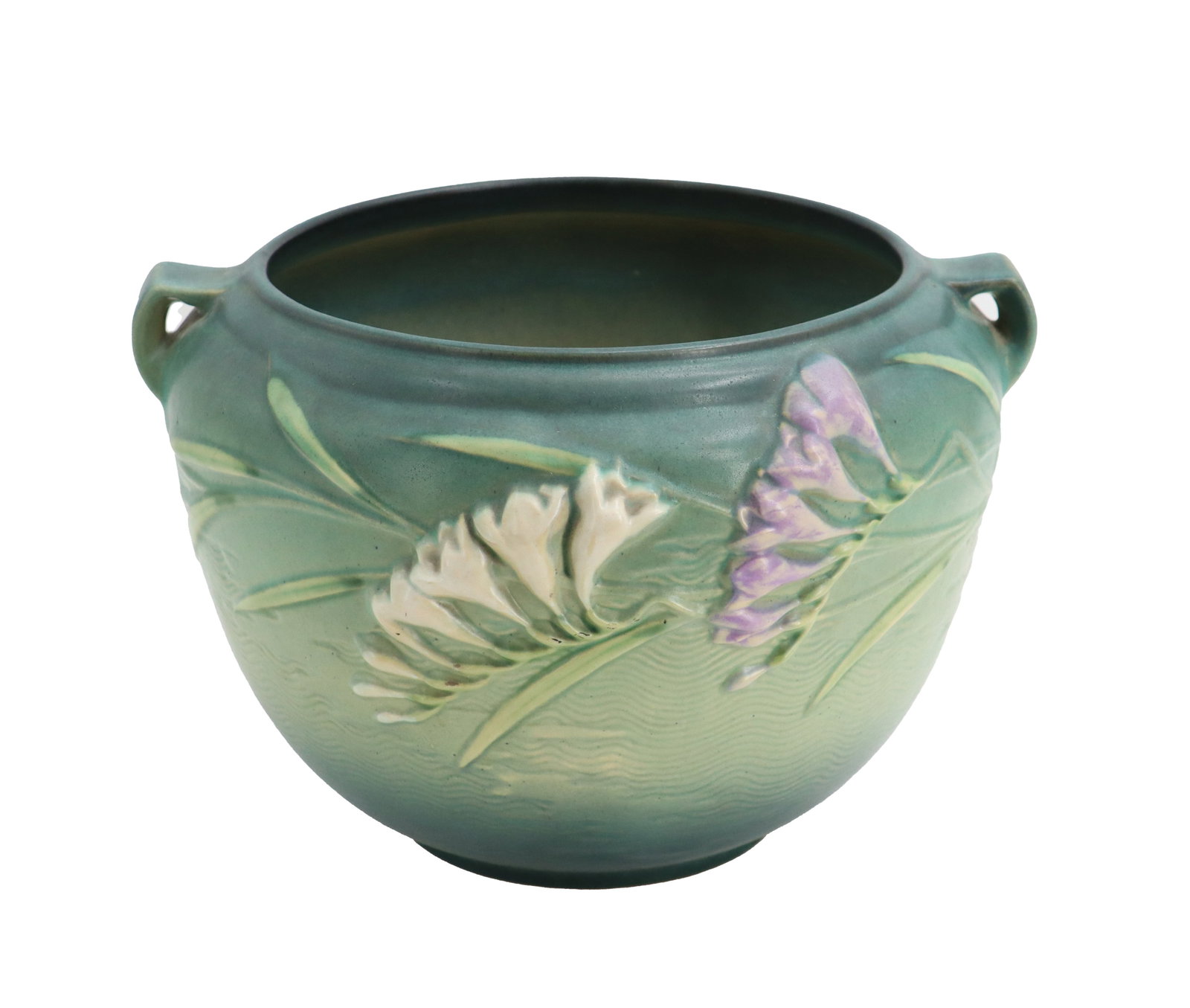 Roseville Pottery Freesia Jardiniere: Roseville Pottery Freesia Jardiniere. Roseville jardiniere with freesia blossom decoration on gray-blue ground. Size: 8 x 12 x 12 in. Roseville Pottery, founded in Roseville, Ohio, in 1890, bec