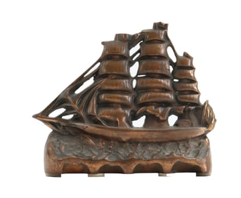 Vintage Cast Iron Clipper Door Stop