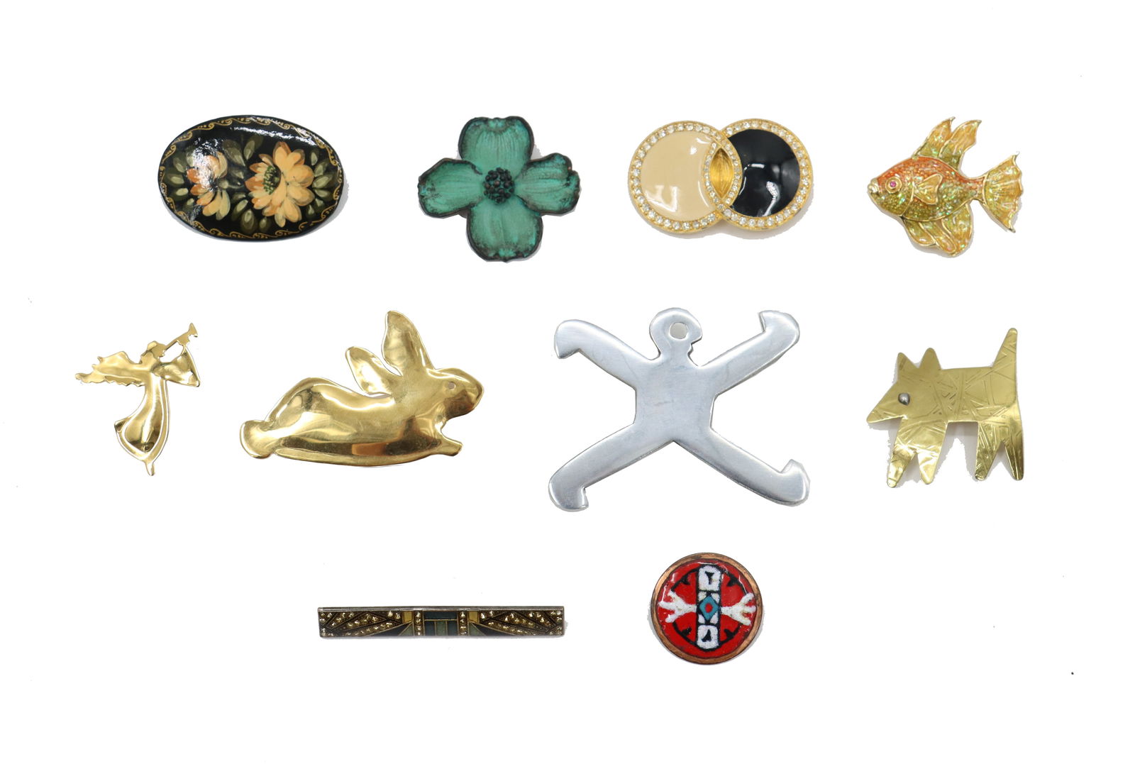 (10) Vintage Costume Brooches: (10) Vintage Costume Brooches. Ranging from animal and floral motifs to abstract and figural pieces. Two are brass dipped in 24k gold. Size: 3 x 2 1/2 in.