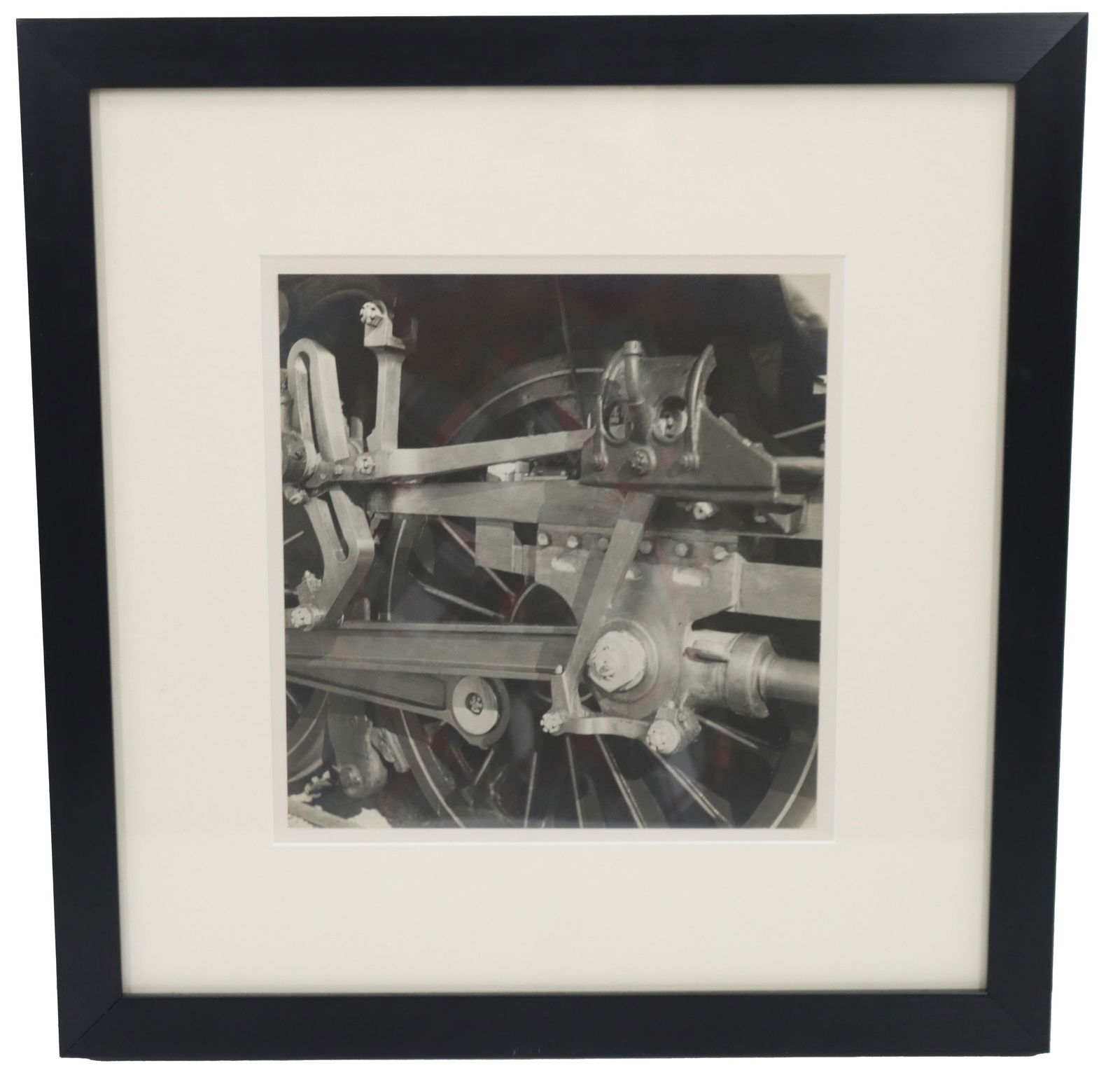 Attributed Roche (20th Century) Industrial Photograph of Steam Locomotive: Attributed Roche (20th Century) Industrial Photograph of Steam Locomotive. Monochrome photograph of the wheel assemblage of a steam locomotive. Framed.Steam locomotives, the iron giants of the