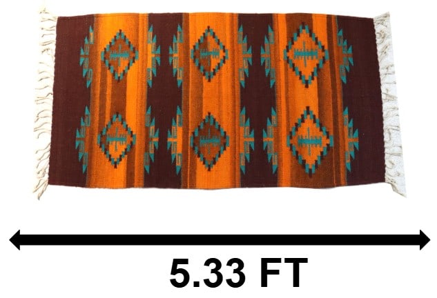 Mexican Zapotec Wool Rug with Geometric Patterns: Mexican Zapotec Wool Rug with Geometric Patterns. Rich tones of chocolate, orange, and eggshell blue create an almost shimmering effect across the rug. Size: 64 x 31 in. Teotitlán d