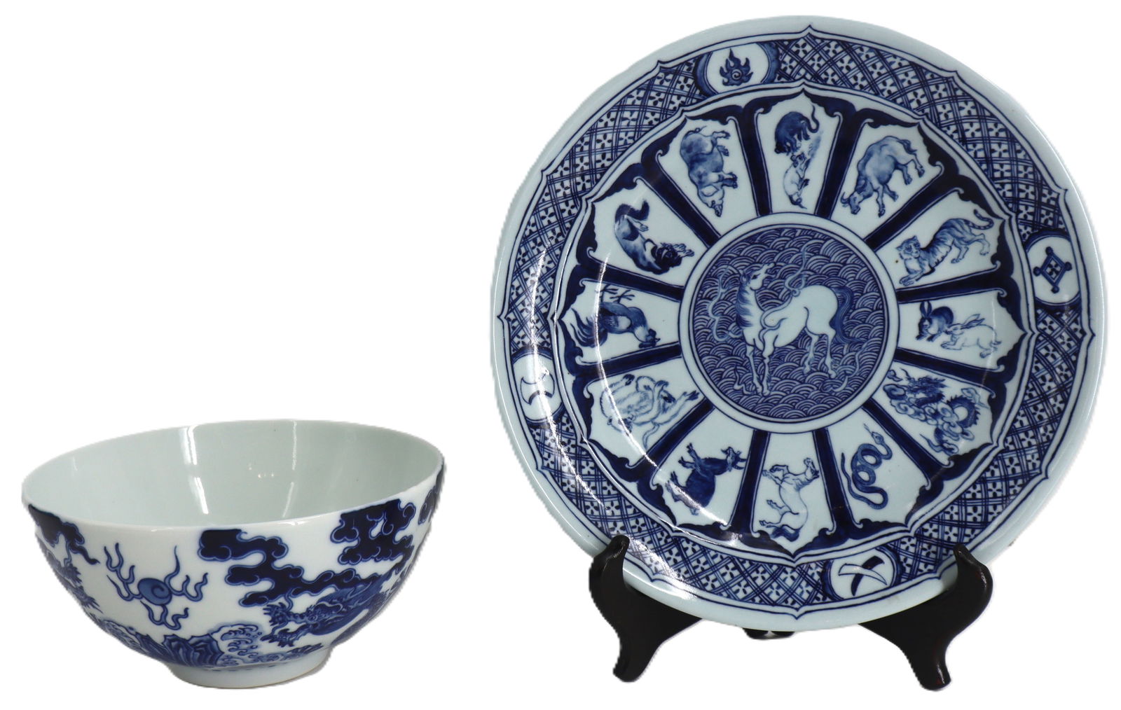 (2) Pieces Chinese Export Blue and White Porcelain Serveware: (2) Pieces Chinese Export Blue and White Porcelain Serveware. Bowl has the motif of dragons among clouds. Honorific Qianlong mark on base. Plate has the twelve animals of the Chinese Zodiac