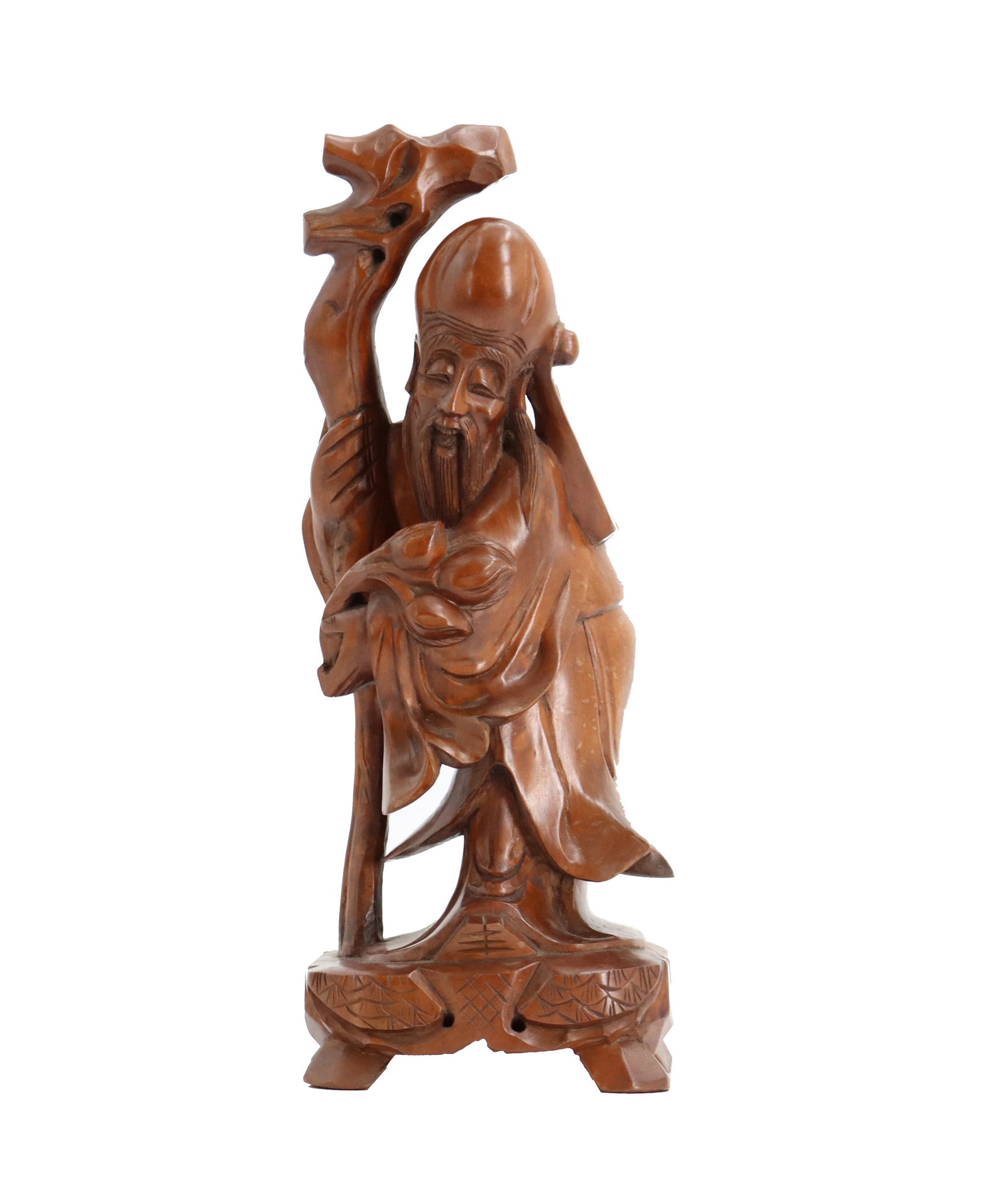 Chinese Carved Wood Shou Lao Statue: Chinese Carved Wood Shou Lao Statue. Depicts the deity in a traditional pose on a stand with four stout feet. Condition: Staining to wood on lower half. Size: 4 1/2 x 4 x 12