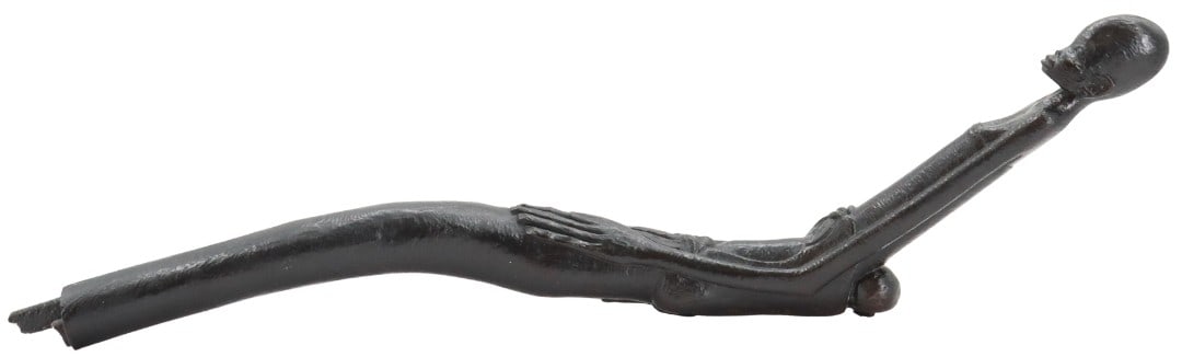 African Carved Wood Elongated Mother and Child: African Carved Wood Elongated Mother and Child. African elongated figural carving of a woman and child, originally serving as the end piece of a larger work. Carved wood with black lacquered