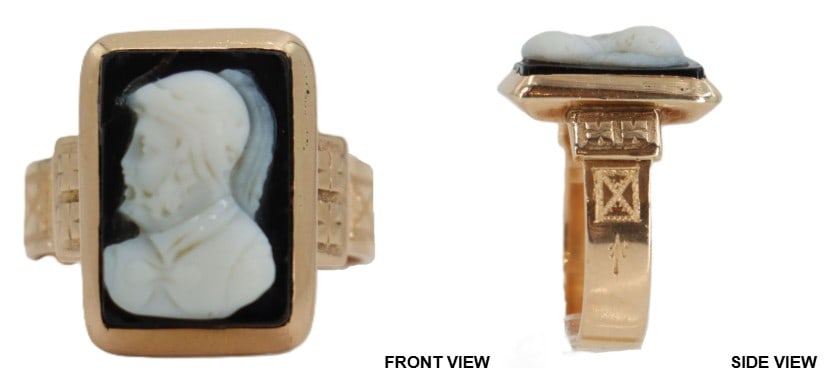 One Tested 10k Gold and Onyx Ring - Gross 9.0 g.: One Tested 10k Gold and Onyx Ring. Yellow gold. Signet style ring features a rectangular black onyx tablet set with a white shell cameo of a classic Roman soldier in profile. The gold band is det