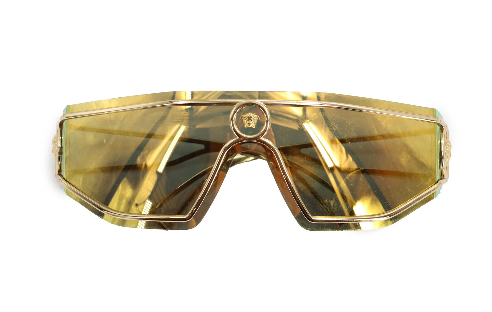 Versace Shield Medusa Sunglasses: Versace Shield Medusa Sunglasses. Features the iconic Medusa head logo on the bridge and on the temple hinges. Model number 2226. Color code is 1002/7P. Gold metal frame with gold brown mirrored