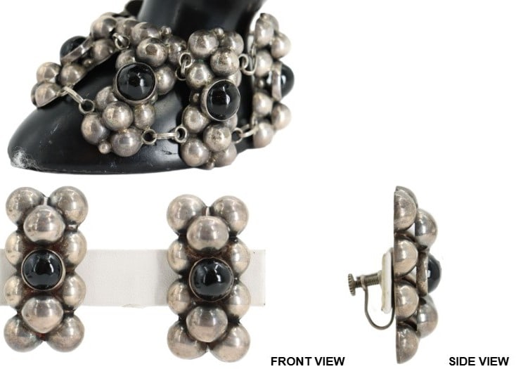 One Mexican Silver and Onyx Bracelet and (1) Pair of Earrings - Gross 2.455 ozt.: One Mexican Silver and Onyx Bracelet and (1) Pair of Earrings. Round cut black onyx set in Mexican sterling silver. Earrings are screw backs. Largest Size: 1 3/4 x 6 1/4 in. Gross Wei