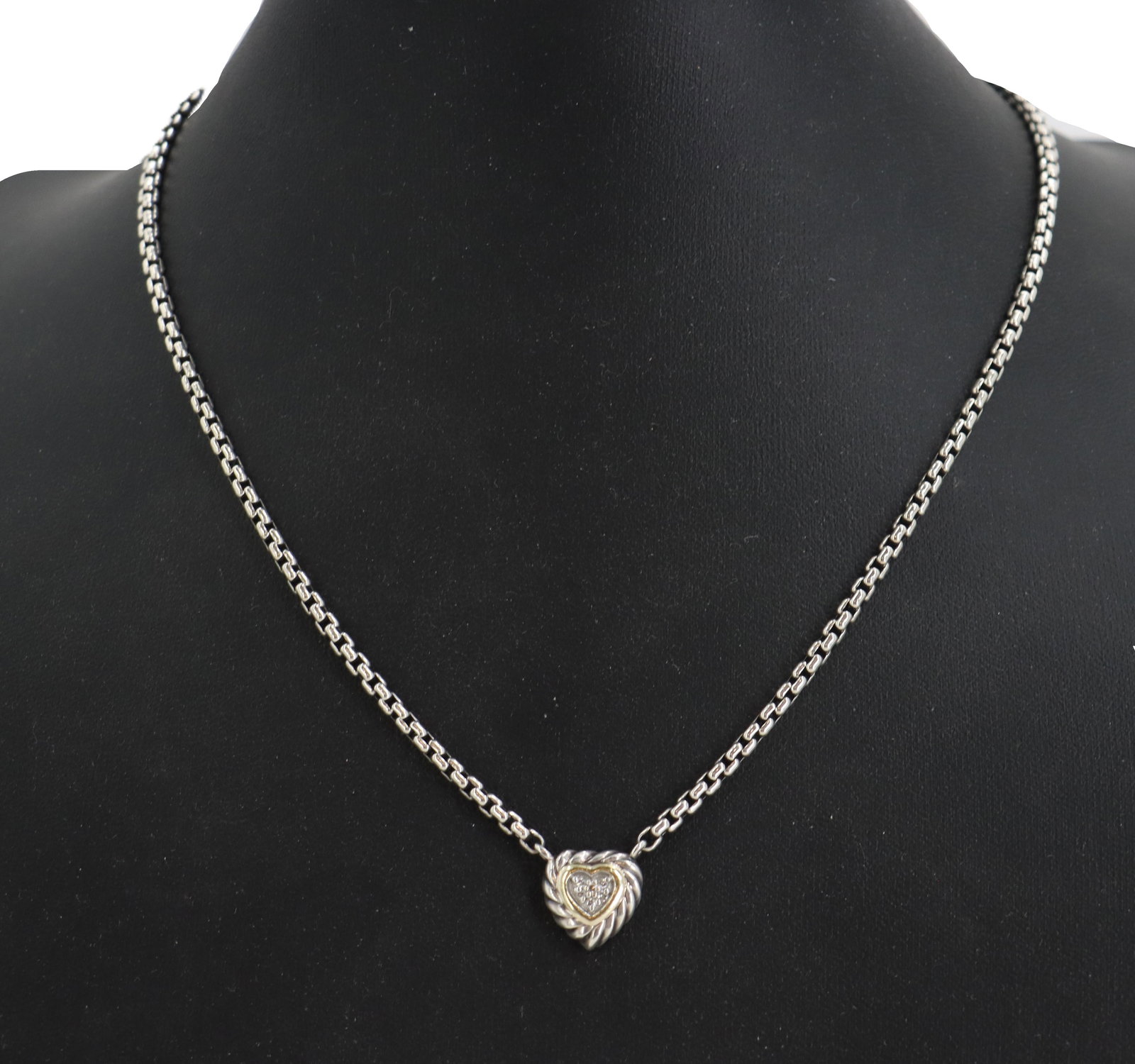 David Yurman Cable Collectibles 18k Gold, Sterling Silver, and Diamond Heart Necklace: David Yurman Cable Collectibles 18k Gold, Sterling Silver, and Diamond Heart Necklace. Marked on back of pendant. Sterling silver box chain with a signature twisted cable heart pendant. Pendant accent