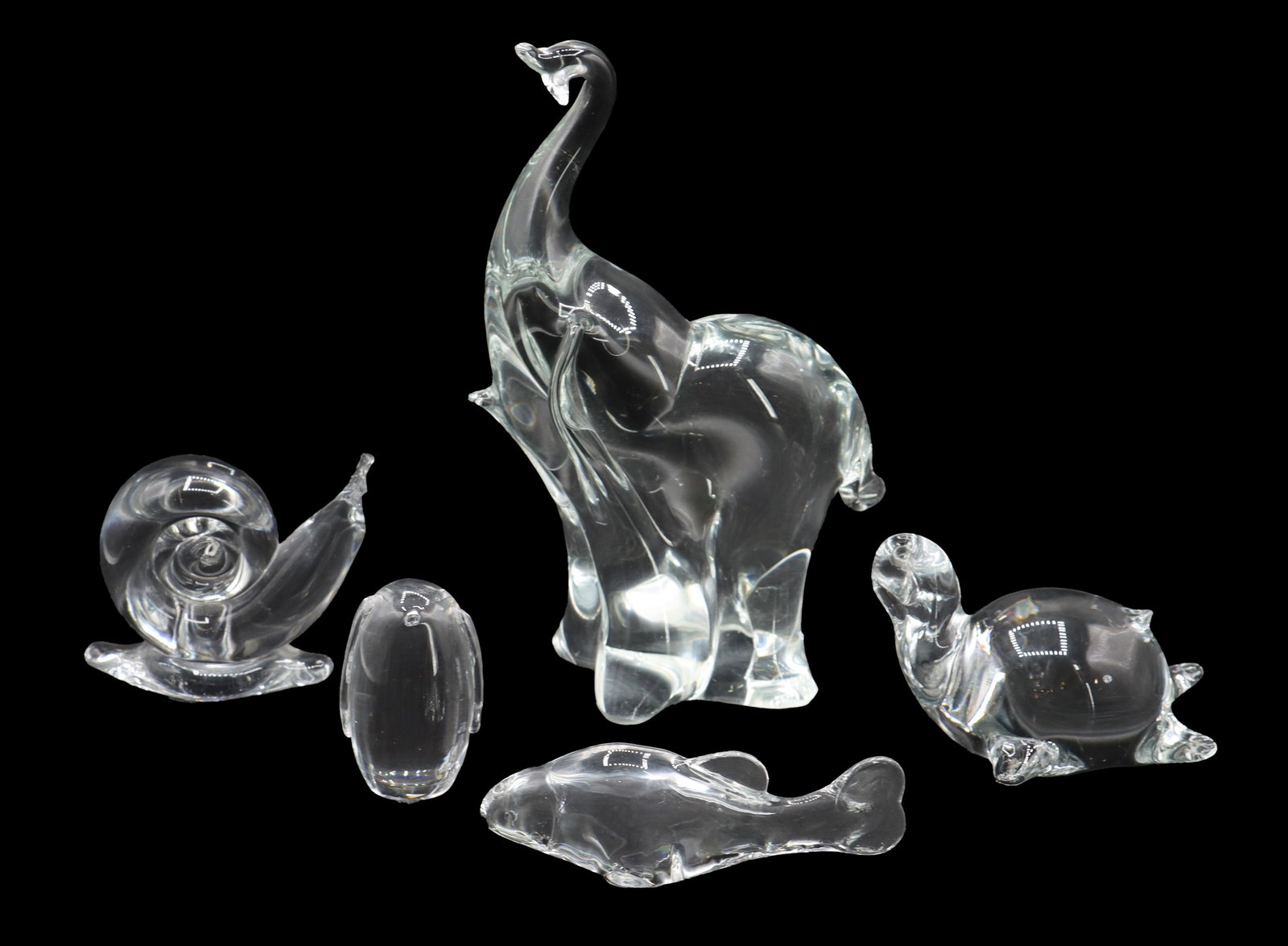 (5) Scandinavian Glass Animal Figurines: (5) Scandinavian Glass Animal Figurines. Includes pieces from Hadeland Glassverk in Norway, Eneryda Glasbruk in Sweden, and more: a snail, a Swedish fish, a turtle, an elephant with an upstr