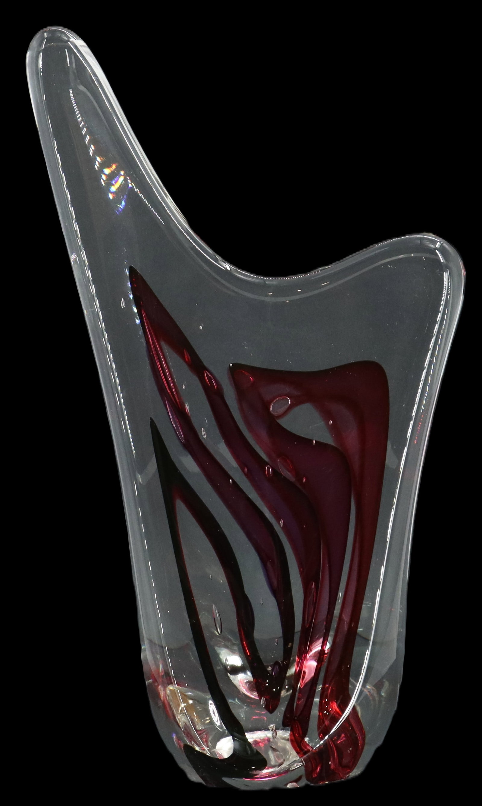 Rollin Karg (Born 1944) American, Abstract Blown Glass Sculpture: Rollin Karg (Born 1944) American, Abstract Blown Glass Sculpture. Elegant, asymmetrical art glass vase featuring a clear, fluid silhouette accented by bold internal swirls of deep magenta and bl