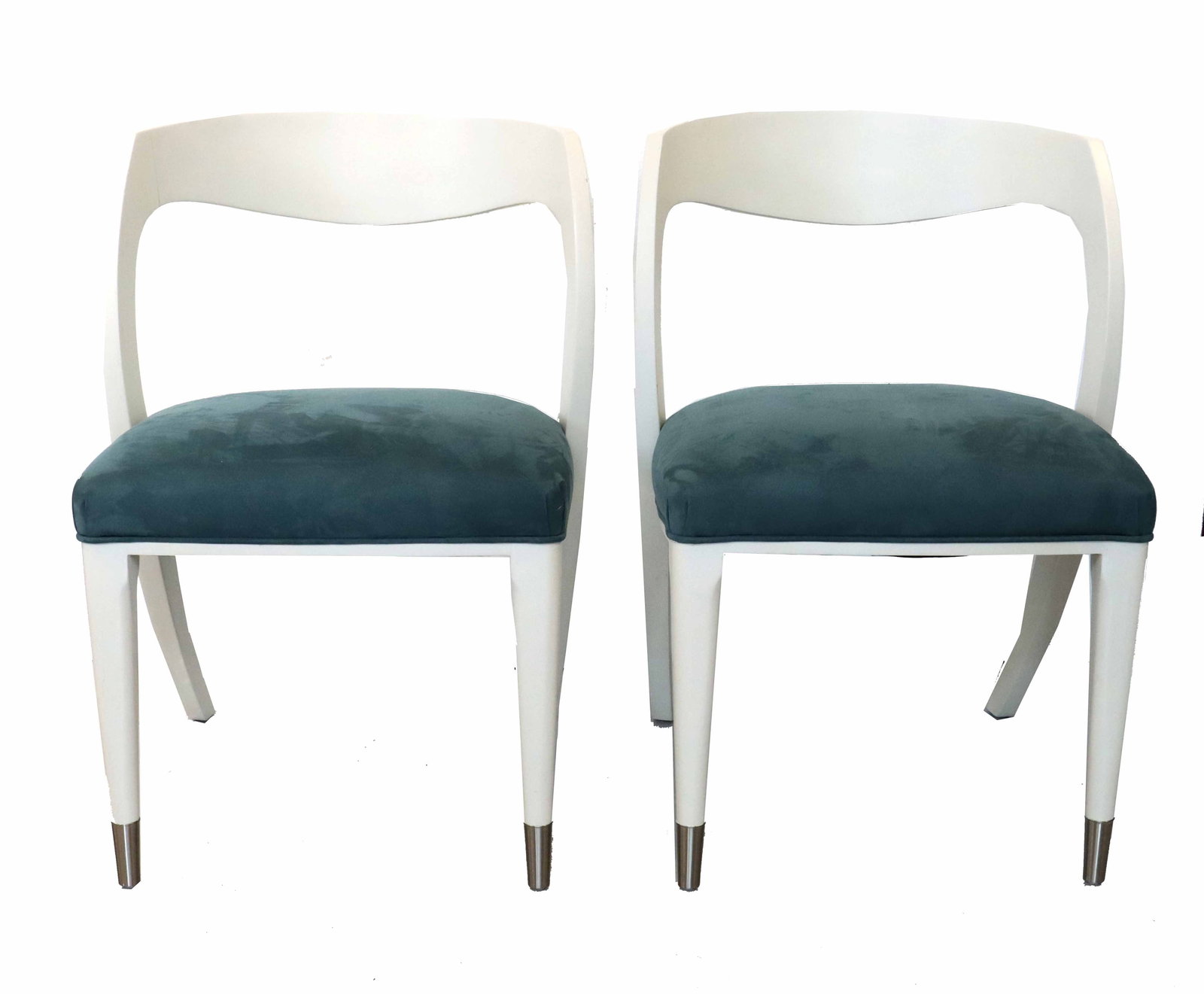 (2) Caracole "Be My Guest" Side Chairs: (2) Caracole "Be My Guest" Side Chairs. Part of the Caracole Classic collection. Modern interpretation of the Klismos style. Finished in a glossy white often referred to as "Almost Whit