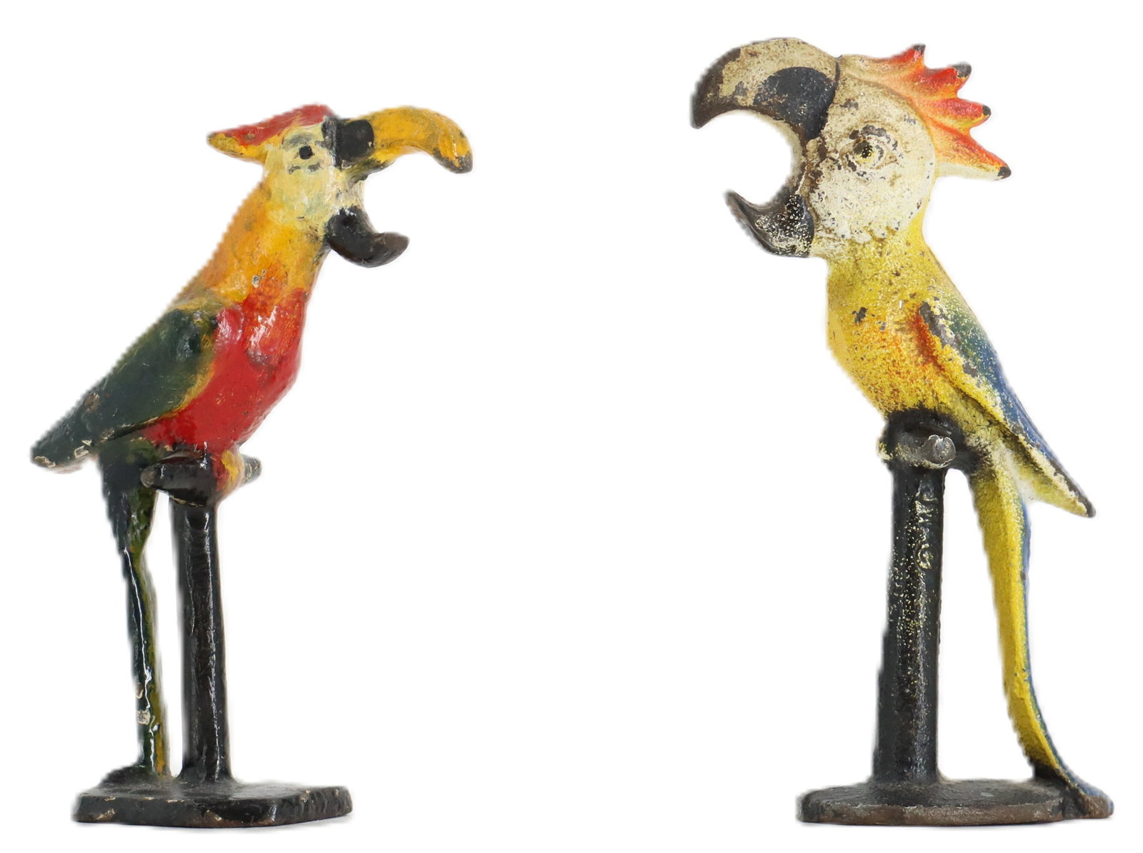 Vintage Cast Iron Polychrome Parrot Bottle Openers: Vintage Cast Iron Polychrome Parrot Bottle Openers. One larger with a crest, the other with more customary parrot colors. Likely manufactured by John Wright Inc. starting in the 1930s, capit