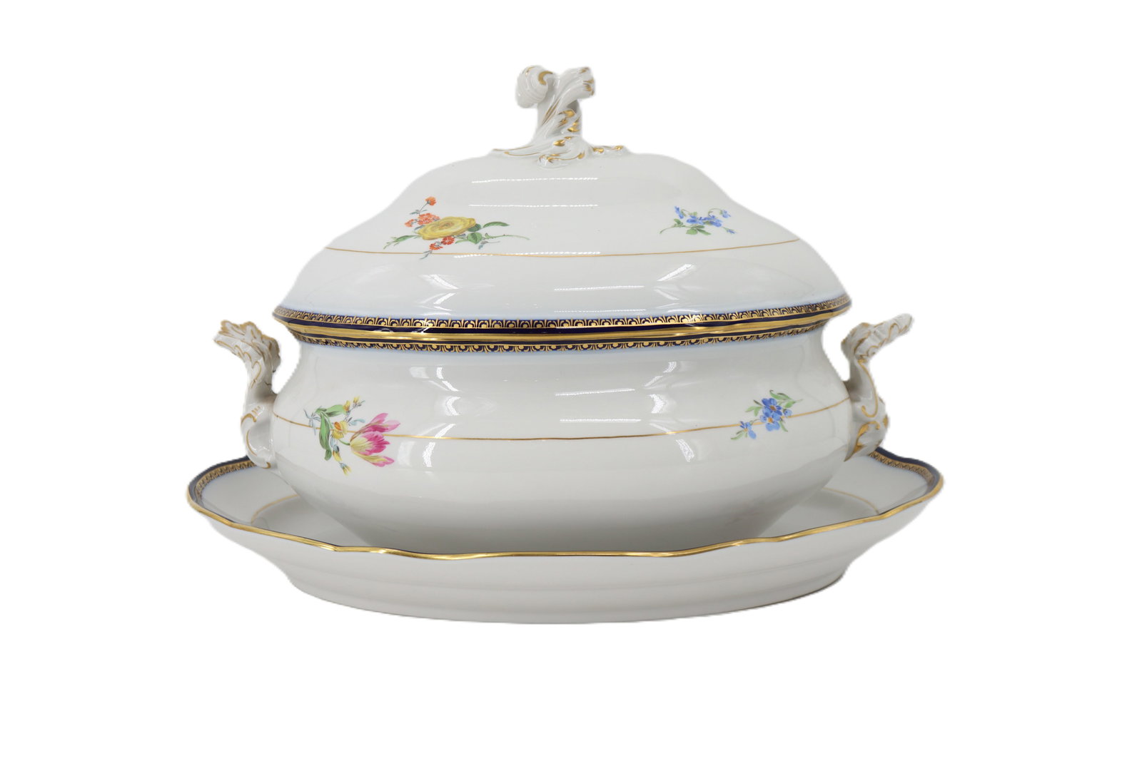 Antique German White & Floral Meissen Tureen and Underplate: White & Floral Meissen Tureen and Underplate. Flowers typical of Meissen quality, vibrant, great details, and pop beautifully throughout the design. Plate Size: 16 1/2 x 12 x 2 in. 