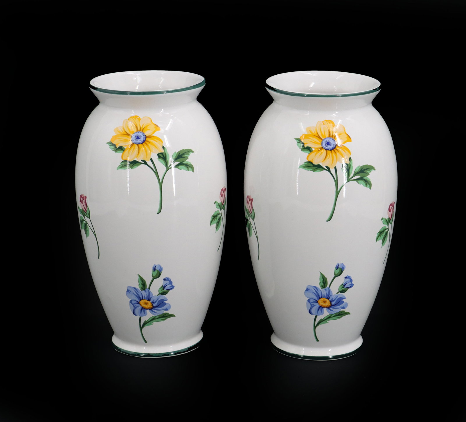 (2) Matching Tiffany & Co. Sintra Porcelain Vases: (2) Matching Tiffany & Co. Sintra Porcelain Vases. Named after the city in Portugal in which they were made, these pieces were produced in the 1990s and are now discontinued. Identical floral