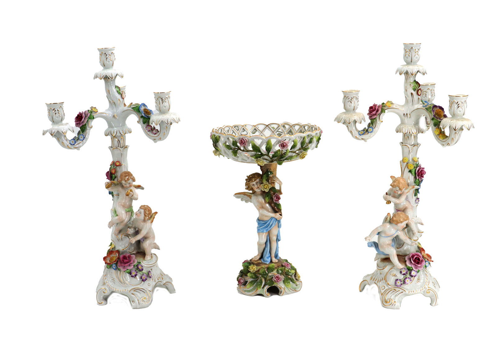 (3) Vintage German Von Schierholz Porcelain Centerpiece Set: (3) German Von Schierholz Porcelain Centerpiece Set. Three-piece set of ornate hand-painted porcelain, consisting of a central lattice-work compote and a matching pair of three-arm candelabras, a