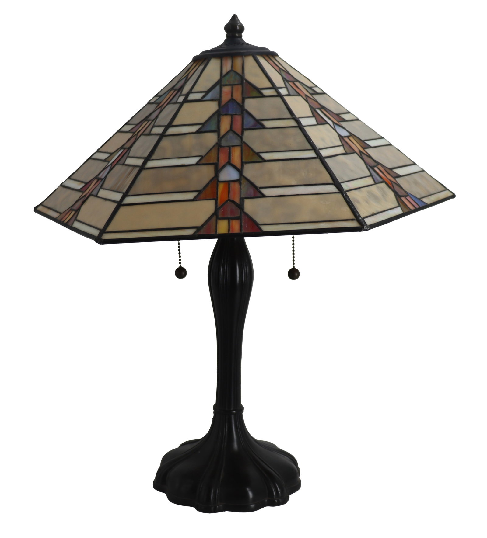 Quoizel Bronze and Stained Glass Table Lamp: Quoizel Bronze and Stained Glass Table Lamp. The hexagonal pyramid shade boasts multiple colors with iridescence, and the Arts and Crafts style column is completed by a scalloped foot. Marked on the e