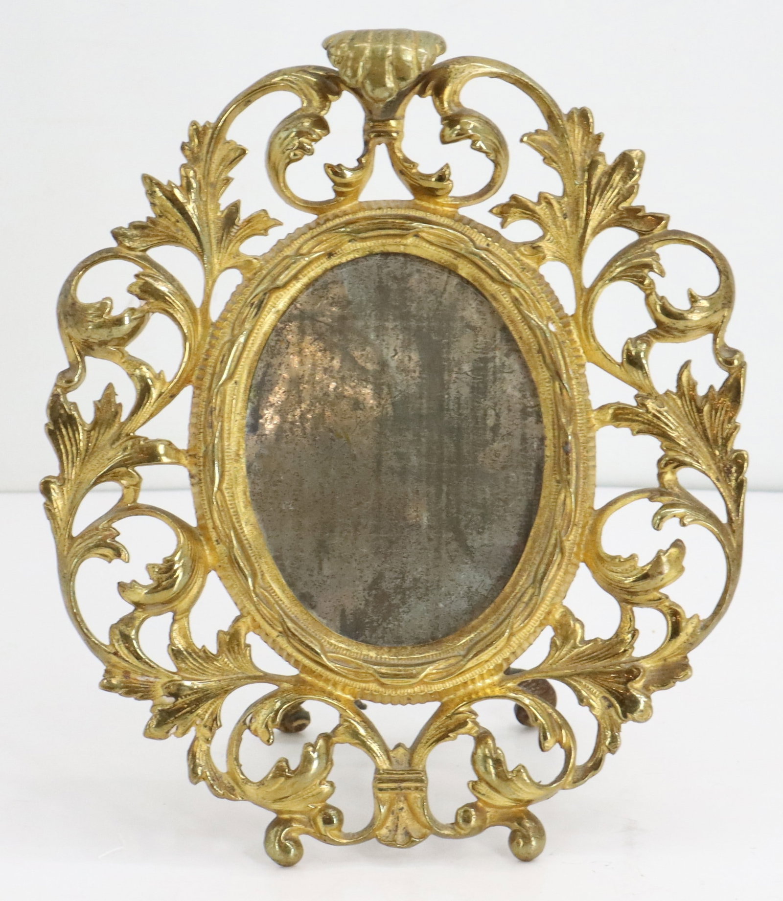 Antique Gilt Bronze Table Mirror: Antique Gilt Bronze Table Mirror. Size: 8 1/2 x 10 1/4 in.