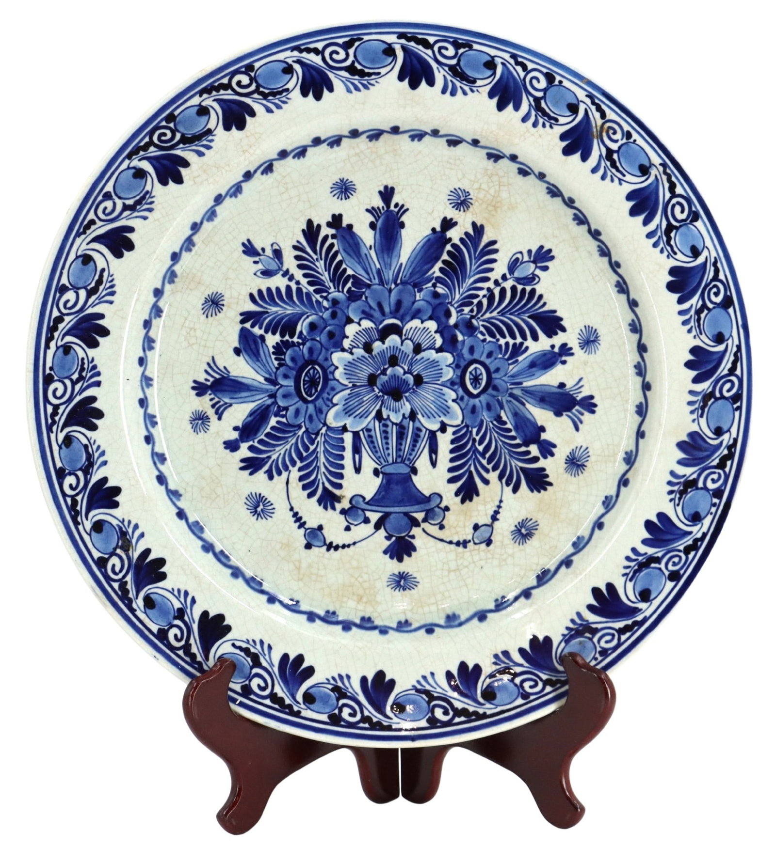 Antique Royal Delft Hand Painted Earthenware Charger Plate: Antique Royal Delft Hand Painted Earthenware Charger Plate. Delicate floral patterns around the edges and a beautiful bouquet in center. Marked and dated 1916 on the underside. Size: 13 1/4 x 1