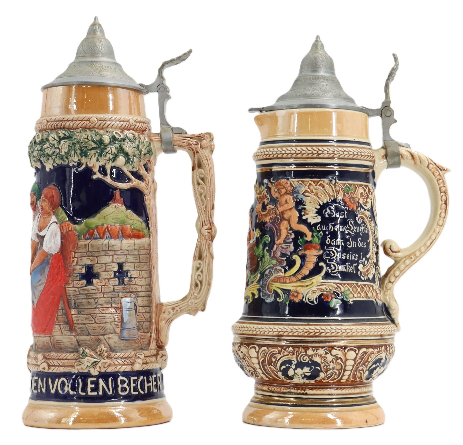 Pair of Vintage German Porcelain and Pewter Steins - AS IS: Pair of Vintage German Porcelain and Pewter Steins - AS IS. Traditional pastoral designs on both, with hinged lids. Both marked "Made in Germany," on the bottom, along with other markings an