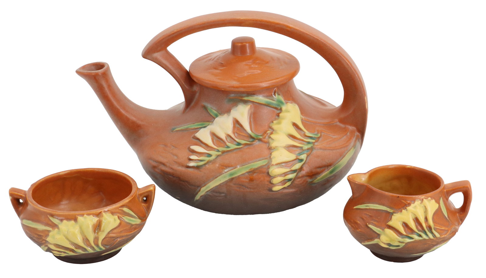 (3) Piece Roseville Pottery Freesia Tea Set: (3) Piece Roseville Pottery Tea Set. Collection consists of two tall, two-handled vases and a low rectangular planter or trough, all featuring the vintage Roseville Freesia art pottery pattern with