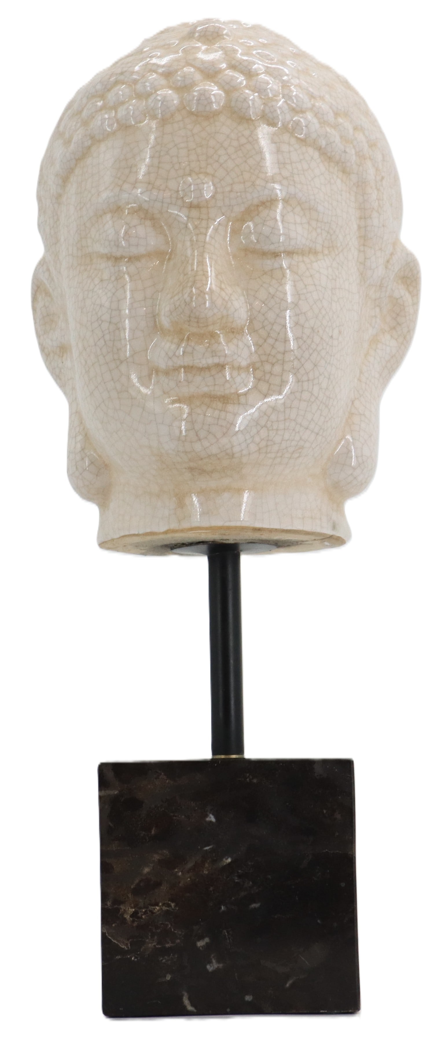 Javanese White Crackle Ceramic Buddha Head on Stone Stand: Javanese White Crackle Ceramic Buddha Head on Stone Stand. The Javanese Buddha has the most reserved Ushnisha (cranial bump) of all depictions of the figure except perhaps in Malaysia, and the Javanes
