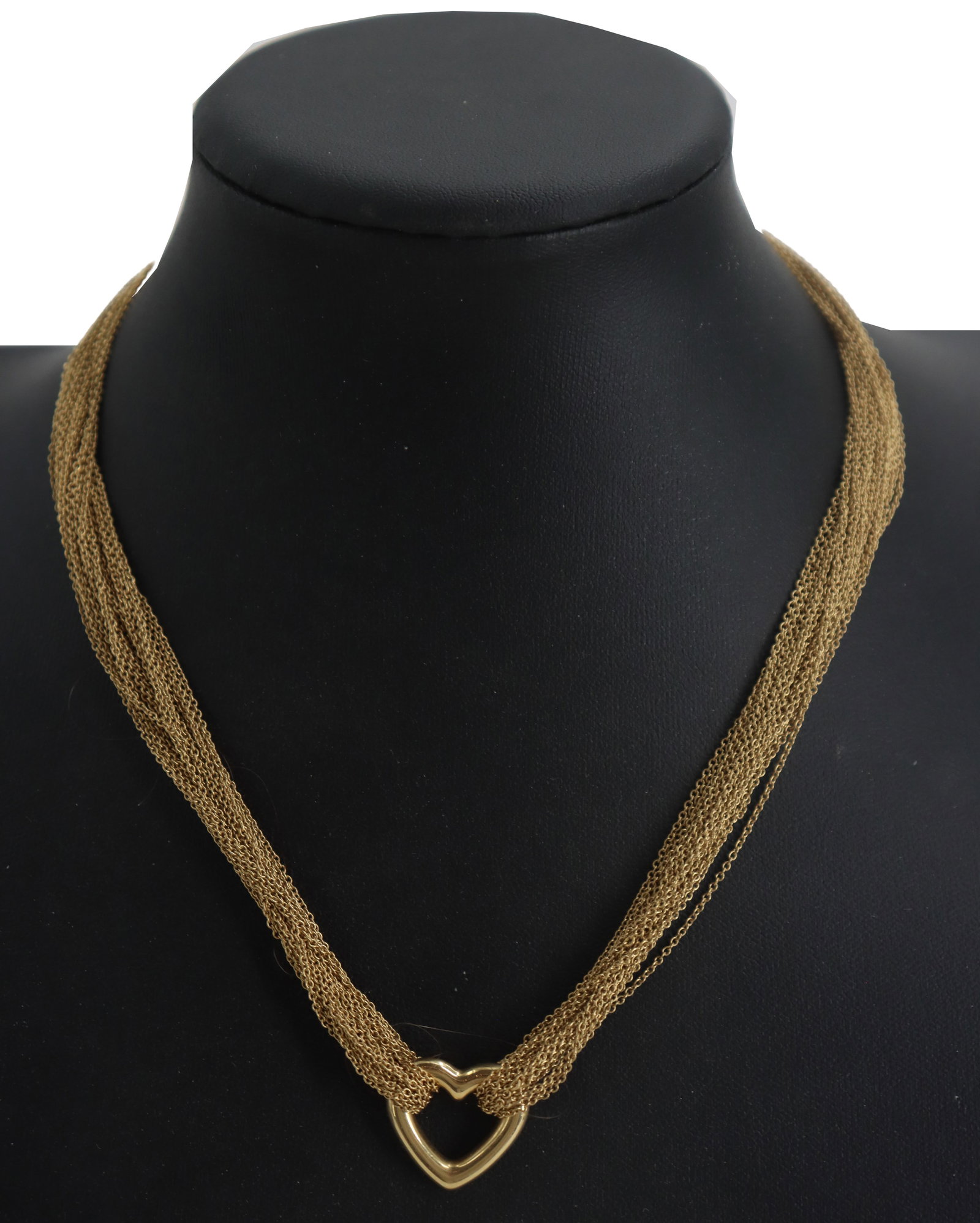Tiffany & Co 18k Gold Multichain Necklace - 42.4 g.: Tiffany & Co 18k Gold Multichain Necklace - 42.4 g. 18k gold Tiffany & Co. necklace with multi-strand cable chain that converges at a central, polished open-heart pendant. 