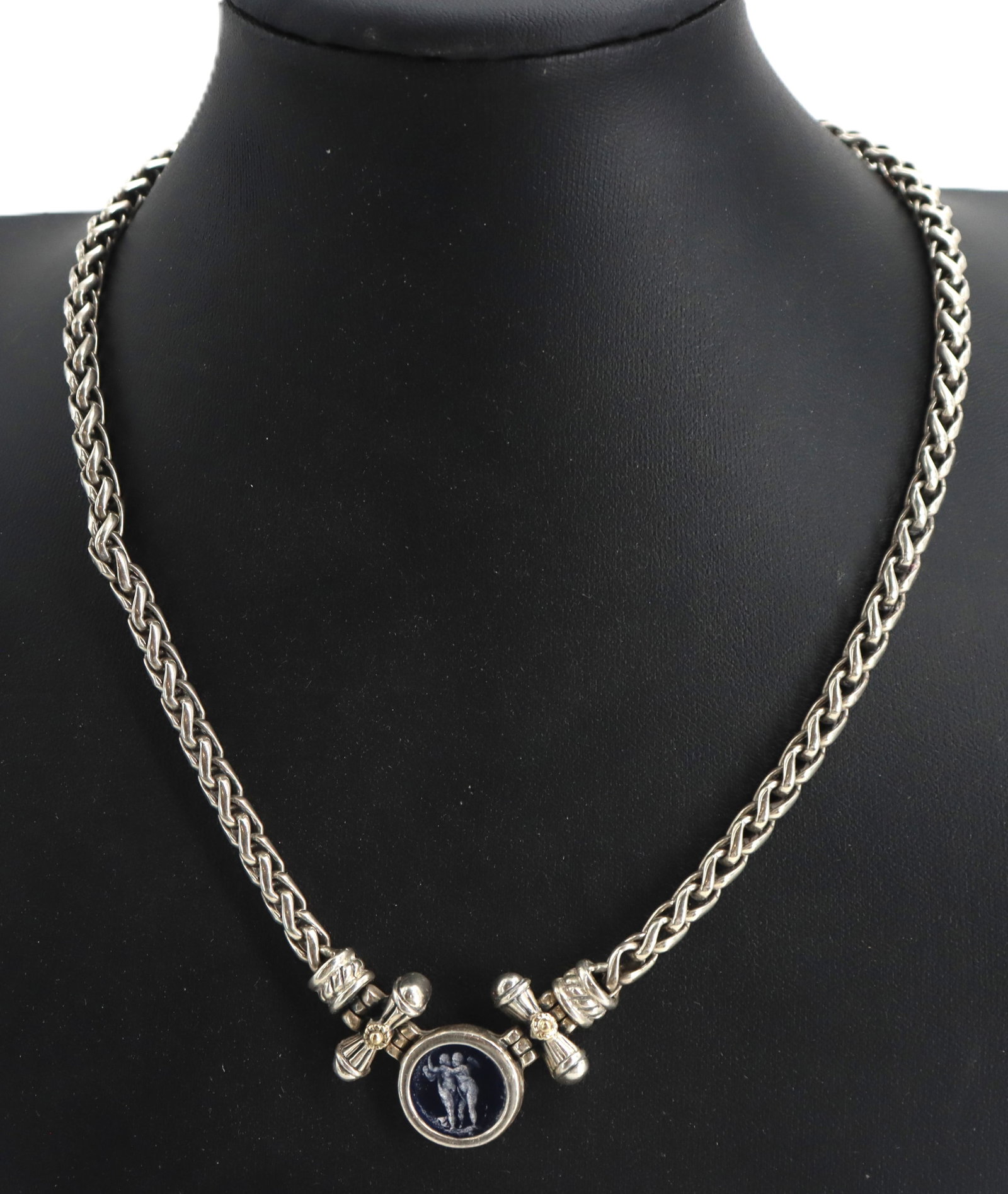 Italian 18k Gold and Sterling Silver Necklace with Blue Intaglio Glass Pendant - Gross 45.6 g.: Italian 18k Gold and Sterling Silver Necklace with Blue Intaglio Glass Pendant - Gross 45.6 g. The heavy chain is connected in the middle by a striking round blue glass pendant etched with two embraci